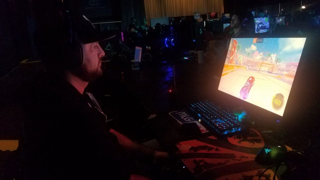 Man playing video game at a gaming event